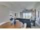 Open-concept living space with hardwood floors, comfortable seating, and access to a bedroom at 8255 Las Vegas S Blvd # 1414, Las Vegas, NV 89123