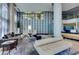 Elegant lobby featuring modern decor, comfortable seating, and natural light at 8255 Las Vegas S Blvd # 1414, Las Vegas, NV 89123
