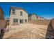 A spacious, undeveloped backyard with block wall, ready for landscaping and outdoor living at 8278 Palladium St, Las Vegas, NV 89113