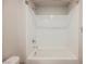 Shower and bath area with bright white tile and chrome fixtures at 8278 Palladium St, Las Vegas, NV 89113