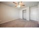 Bedroom features carpet flooring and a closet with sliding doors at 8278 Palladium St, Las Vegas, NV 89113