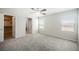 Bright bedroom featuring a walk-in closet and an ensuite bathroom with natural light coming in through the windows at 8278 Palladium St, Las Vegas, NV 89113