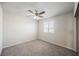Spacious bedroom with neutral walls, carpet, and ceiling fan at 8278 Palladium St, Las Vegas, NV 89113