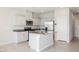 Modern kitchen featuring stainless steel appliances, granite countertops and ample white cabinetry at 8278 Palladium St, Las Vegas, NV 89113