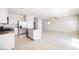 Modern kitchen with stainless steel appliances and a center island overlooking the living space at 8278 Palladium St, Las Vegas, NV 89113