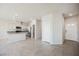 Open-concept living space showcasing tile flooring and a combined kitchen and living area at 8278 Palladium St, Las Vegas, NV 89113