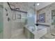 Modern bathroom featuring a stand-up shower and separate soaking tub at 8914 Termoli St, Las Vegas, NV 89123
