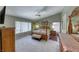 Spacious bedroom with a ceiling fan, and a large bed frame at 8914 Termoli St, Las Vegas, NV 89123