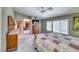 Bright bedroom with a ceiling fan, and a large bed frame at 8914 Termoli St, Las Vegas, NV 89123