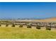 A well-maintained lawn offers views of the surrounding neighborhood and distant mountains at 901 Allister Fields Ln, Las Vegas, NV 89138