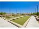 Enjoy outdoor recreation with a bocce ball court surrounded by well-manicured landscaping at 901 Allister Fields Ln, Las Vegas, NV 89138