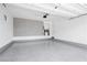 A clean and spacious garage featuring an epoxy floor and custom wall accents at 901 Allister Fields Ln, Las Vegas, NV 89138