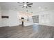 Open-concept living space with island kitchen, stainless appliances, and ample natural light at 901 Allister Fields Ln, Las Vegas, NV 89138