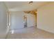 Open-plan living area with tile floors and a view of the kitchen, creating a seamless transition at 9017 Iron Hitch Ave, Las Vegas, NV 89143