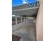 Spacious covered back patio, perfect for outdoor entertaining and relaxation in this desert home at 994 River Walk Ct, Henderson, NV 89015