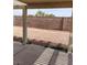 Covered patio overlooking a gravel backyard area at 994 River Walk Ct, Henderson, NV 89015