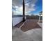 Backyard with gravel landscaping, block fencing and a patio cover in this home at 994 River Walk Ct, Henderson, NV 89015