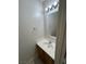 Half bathroom with a single sink vanity and neutral walls at 994 River Walk Ct, Henderson, NV 89015