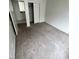 Bedroom with neutral carpeting and a closet in the background at 994 River Walk Ct, Henderson, NV 89015