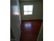 Bright bedroom featuring wood floors and a window offering natural light at 994 River Walk Ct, Henderson, NV 89015