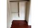 A closet with white shelving and dark wood floors at 994 River Walk Ct, Henderson, NV 89015