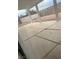 Covered patio with concrete slab and gravel backyard at 994 River Walk Ct, Henderson, NV 89015