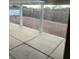 Covered patio area with concrete slab and gravel backyard at 994 River Walk Ct, Henderson, NV 89015