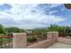 Balcony with lush greenery and scenic views of mountains at 10829 Ickworth Ct, Las Vegas, NV 89135