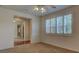Cozy bedroom with an open doorway and views of the backyard at 10829 Ickworth Ct, Las Vegas, NV 89135