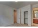 Bedroom featuring a closet with a sliding door and an en-suite bathroom at 10829 Ickworth Ct, Las Vegas, NV 89135