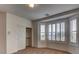 Bedroom with closet space and large window providing ample natural light at 10829 Ickworth Ct, Las Vegas, NV 89135