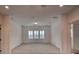 Spacious bonus room with large window and plush neutral carpeting at 10829 Ickworth Ct, Las Vegas, NV 89135