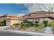 Charming home with a meticulously landscaped front yard, showcasing mature plants and an oversized driveway at 10829 Ickworth Ct, Las Vegas, NV 89135