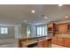 Gourmet kitchen boasting granite countertops, custom cabinets and stainless steel appliances at 10829 Ickworth Ct, Las Vegas, NV 89135