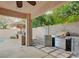 Outdoor kitchen with stainless steel grill and counter, perfect for outdoor entertaining at 10829 Ickworth Ct, Las Vegas, NV 89135