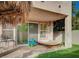 Cozy patio with ample shade, hammock, and seating at 10829 Ickworth Ct, Las Vegas, NV 89135