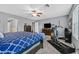 Spacious bedroom features carpeted floors, gray walls, and a ceiling fan providing a relaxing living space at 11023 Ketchikan St, Las Vegas, NV 89179
