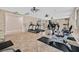 Well-equipped fitness center with treadmills, stationary bikes, and workout mats at 11023 Ketchikan St, Las Vegas, NV 89179