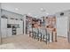 Bright kitchen featuring a center island, stainless steel appliances, and stylish pendant lighting at 11023 Ketchikan St, Las Vegas, NV 89179