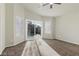 Spacious bedroom featuring plush carpeting and sliding glass doors leading to a backyard pool at 11076 Zampino St, Las Vegas, NV 89141
