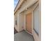 A close-up view of the front door showing the entry and surrounding architecture of this lovely home at 11076 Zampino St, Las Vegas, NV 89141