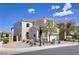 Charming two-story home with red shutters, a red front door, and low-maintenance desert landscaping at 1172 Strada Pecei, Henderson, NV 89011