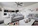 Open concept living room with view to the kitchen, and access to backyard at 1172 Strada Pecei, Henderson, NV 89011