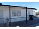 Cozy single-story home featuring a fenced front yard and covered porch at 1316 Lawry Ave, Las Vegas, NV 89106