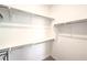 Walk-in closet featuring custom shelving and ample storage space at 187 Palm Fox Ct, Henderson, NV 89011