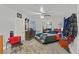 Bedroom features a ceiling fan, a mirrored closet, and neutral walls and decor at 1904 Chapman Dr, Las Vegas, NV 89104