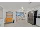 Bright kitchen with white cabinets, stainless steel appliances, and a convenient breakfast bar at 1904 Chapman Dr, Las Vegas, NV 89104