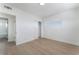 Minimalist bedroom with sleek flooring, white walls, and a closet at 2 Utah Way, Henderson, NV 89015