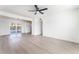 Bright and spacious living area with hardwood floors and a view of the backyard pool at 2 Utah Way, Henderson, NV 89015