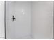 Modern shower featuring white subway tile and black fixtures at 2 Utah Way, Henderson, NV 89015